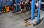 Woman uses umbrella to stop group of men from fighting at Jurong car workshop - 18