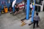 Woman uses umbrella to stop group of men from fighting at Jurong car workshop - 16