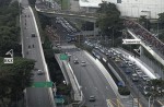 People cross Causeway by foot in massive traffic jam - 1