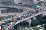 People cross Causeway by foot in massive traffic jam - 13