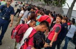 People cross Causeway by foot in massive traffic jam - 16