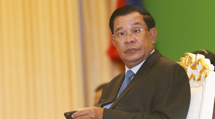 Cambodia PM sets 2018 election date, opposition leaders face legal charges