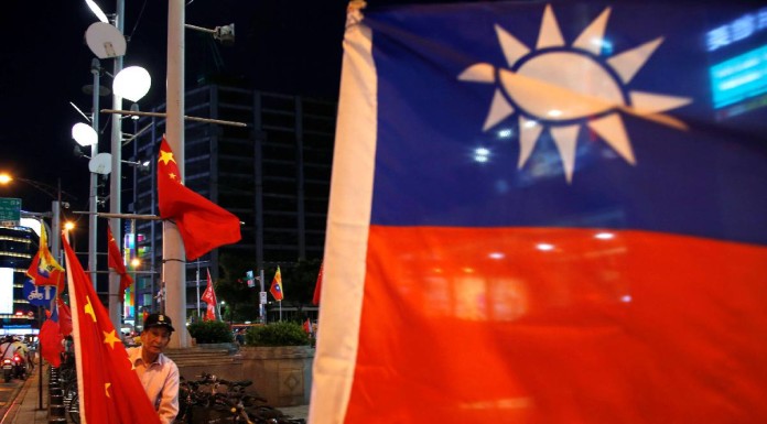 China says Taiwan fraud suspects deported from Malaysia 'confess'