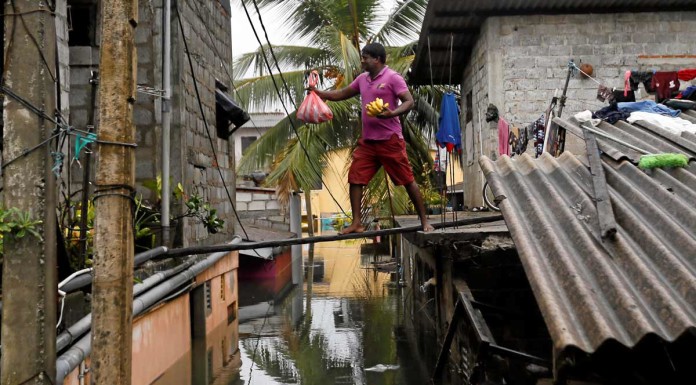 Foreign aid reaches flooded Sri Lankan capital, 71 dead
