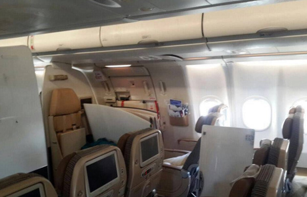 Intense turbulence on flight causes overhead bins to fall out