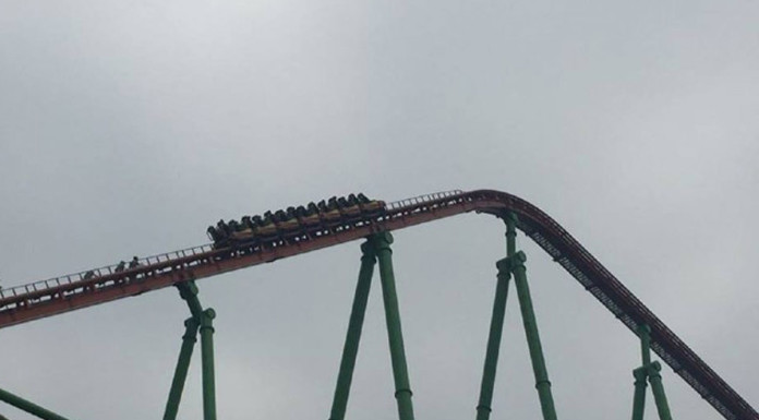 Roller-coaster riders left stranded in mid-air after it broke down