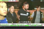 HK police officers suspended for beating up protester - 1