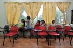 Inside a temporary dorm for maids in Singapore - 1