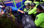 Hundreds of protestors clash with police over Sewol ferry disaster - 10