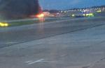 Singapore Airlines plane catches fire at Changi Airport - 1