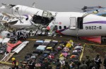 TransAsia Airways plane with 58 onboard lands in Taipei river - 19