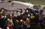 TransAsia Airways plane with 58 onboard lands in Taipei river - 22