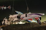 TransAsia Airways plane with 58 onboard lands in Taipei river - 21