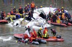 TransAsia Airways plane with 58 onboard lands in Taipei river - 23