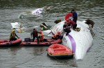 TransAsia Airways plane with 58 onboard lands in Taipei river - 49
