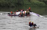 TransAsia Airways plane with 58 onboard lands in Taipei river - 48