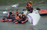 TransAsia Airways plane with 58 onboard lands in Taipei river - 38