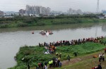 TransAsia Airways plane with 58 onboard lands in Taipei river - 37