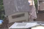 House smashes into pieces after toppling onto another in Japan  - 9