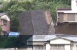 House smashes into pieces after toppling onto another in Japan  - 10