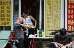 Beggars in China eat at restaurants and shop at Cartier - 9