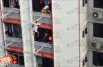 SCDF rescues man hanging precariously on clothes rack in Tampines - 4