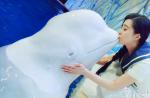 Fan Bingbing riles animal activists by kissing beluga whale - 2