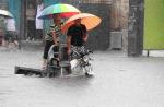 Non-stop rain pours misery on China - 36