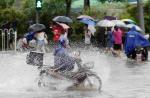 Non-stop rain pours misery on China - 43