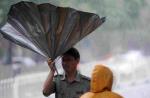 Non-stop rain pours misery on China - 15