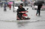 Non-stop rain pours misery on China - 13