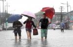 Non-stop rain pours misery on China - 14