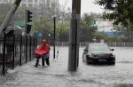 Non-stop rain pours misery on China - 26