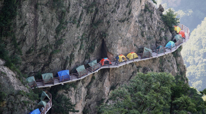 Campers sleep perched on cliff face in China