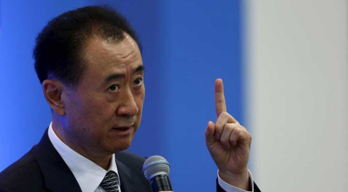 China gets its richest man to back "best football competition in Asia"