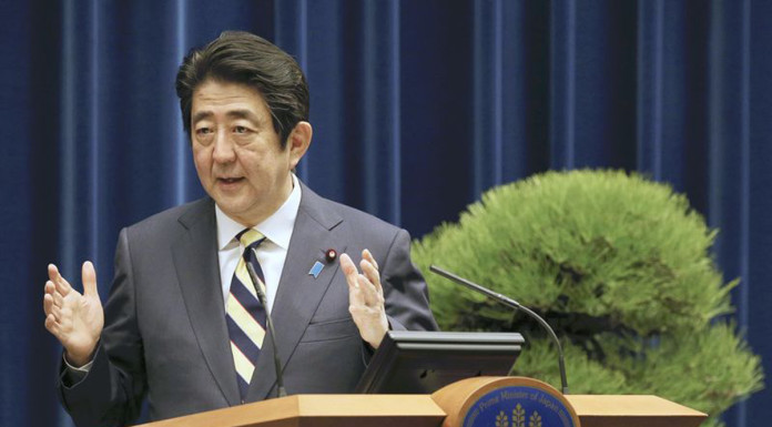 Japan's Prime Minister Shinzo Abe claims victory in parliamentary vote