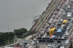 People cross Causeway by foot in massive traffic jam - 4