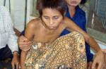 Cambodia's 'jungle woman' returned to Vietnamese father - 1