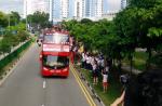 Crowds gather to catch glimpse of Joseph Schooling on victory parade - 18