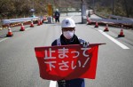 Japanese families torn as return to Fukushima 'hot zone' begins - 19