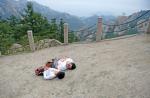 Legless man and boy climb a mountain together - 2