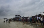 Bangladesh rescuers struggle in hunt for capsized ferry - 8