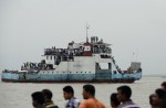 Bangladesh rescuers struggle in hunt for capsized ferry - 16