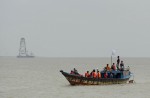 Bangladesh rescuers struggle in hunt for capsized ferry - 17