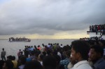 Bangladesh rescuers struggle in hunt for capsized ferry - 22