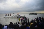 Bangladesh rescuers struggle in hunt for capsized ferry - 21