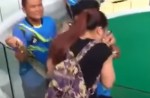 Python bites Chinese tourist after she kisses it during show - 7