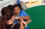 Python bites Chinese tourist after she kisses it during show - 5