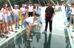 People test strength of glass bridge in China with sledgehammers - 3