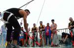 People test strength of glass bridge in China with sledgehammers - 5